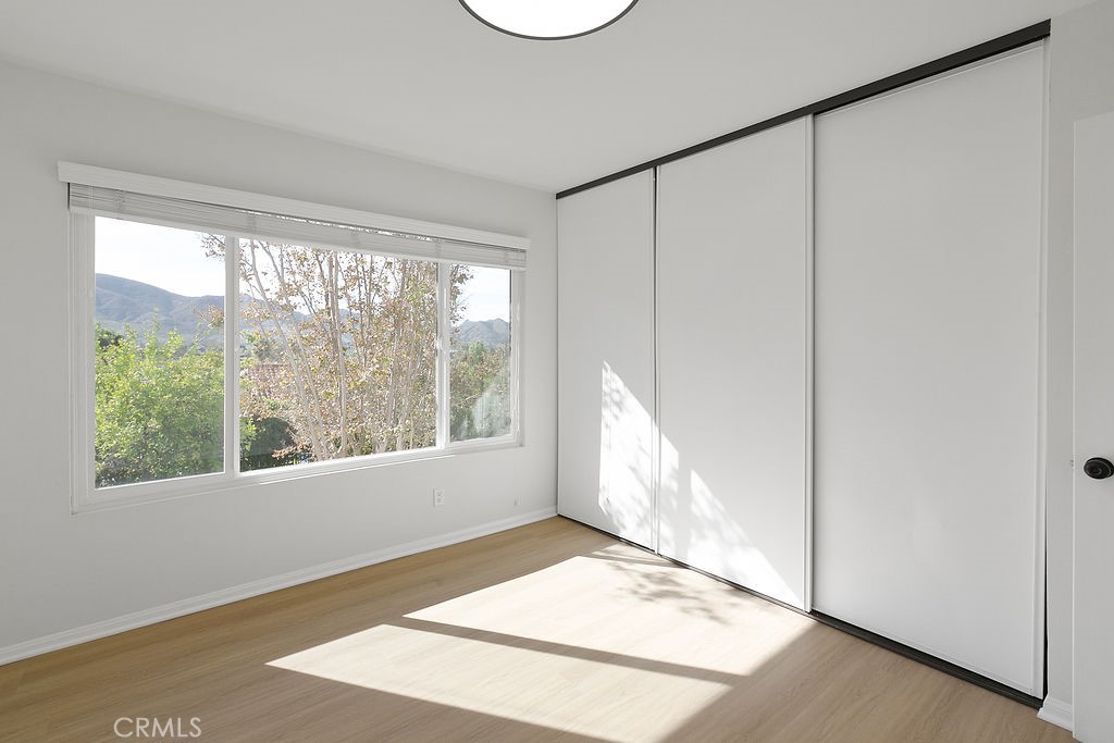 29950 Rolling Ridge Drive Agoura Hills, CA 91301 - Photo 21 of 26 a view of an empty room with a window