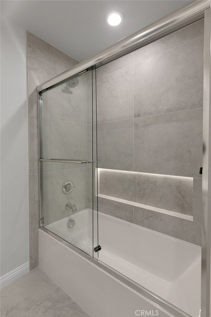 29950 Rolling Ridge Drive Agoura Hills, CA 91301 - Photo 23 of 26 a bathroom with a bathtub and a shower