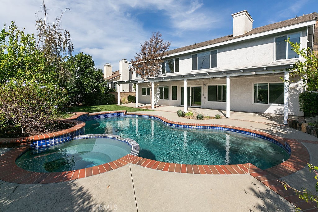 29950 Rolling Ridge Drive Agoura Hills, CA 91301 - Photo 26 of 26 a view of a house with swimming pool