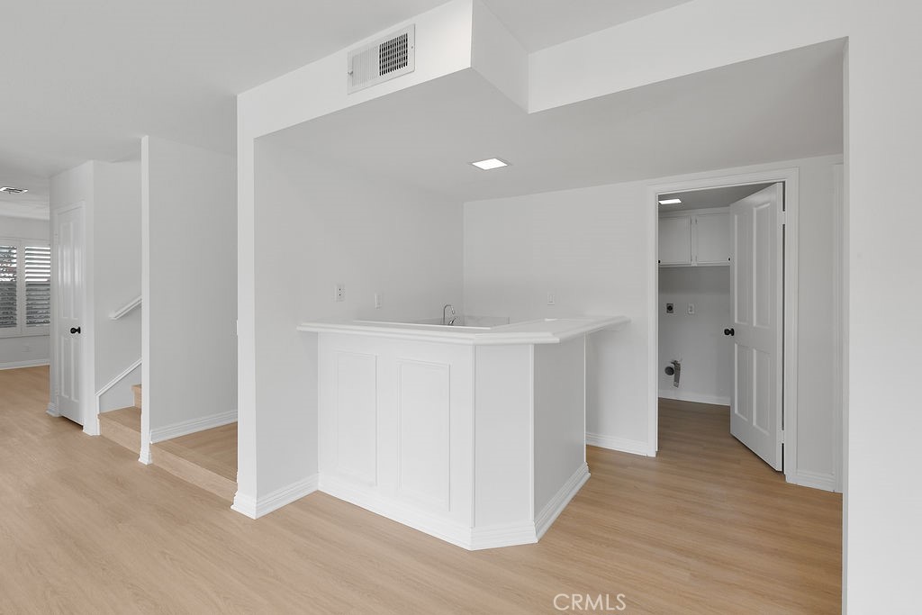 29950 Rolling Ridge Drive Agoura Hills, CA 91301 - Photo 10 of 26 a view of hallway with wooden floor