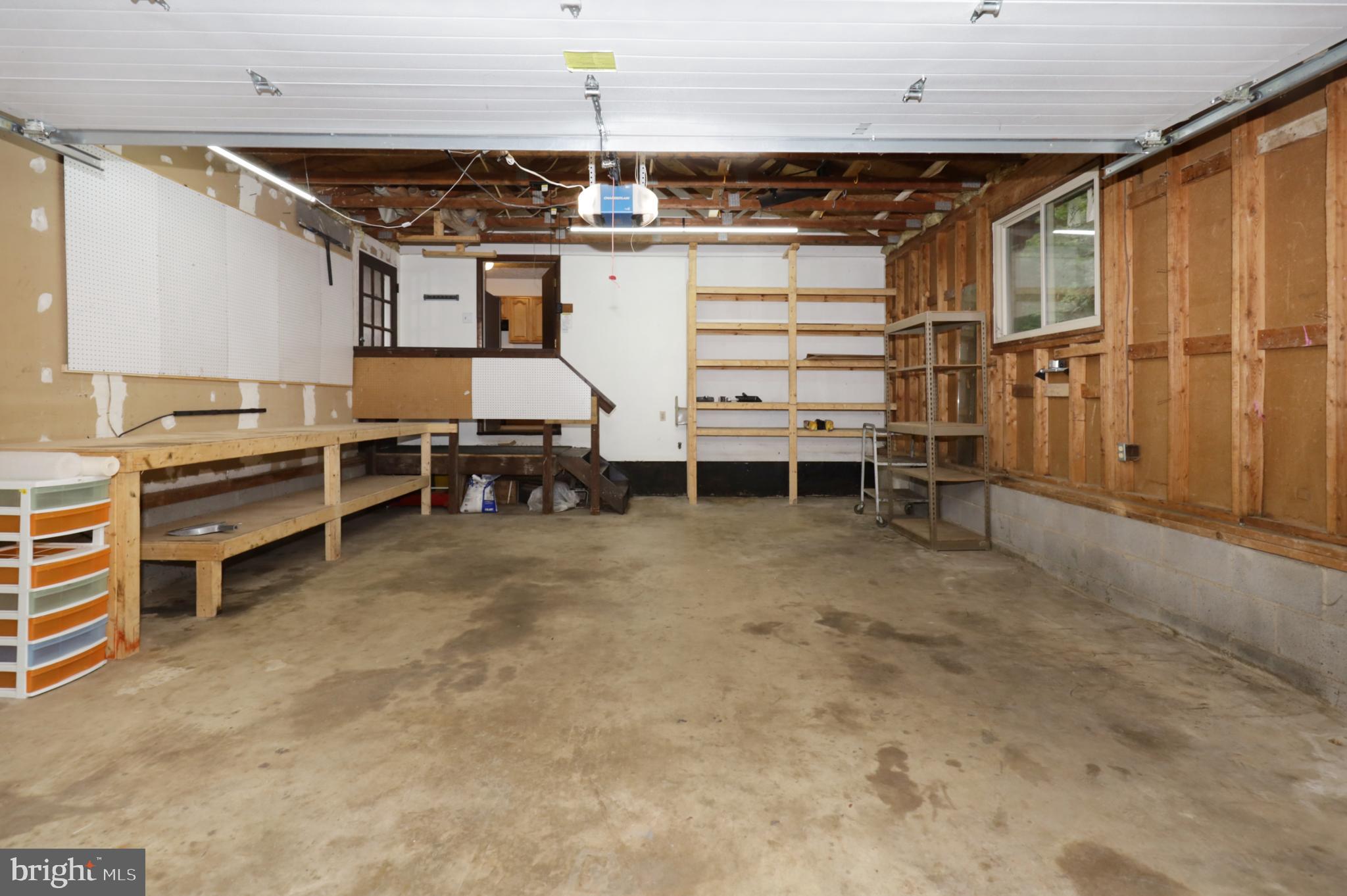 11800 Wolf Run Lane Clifton, VA 20124 - Photo 53 of 56 2-Car Garage with Workbench & Shelves