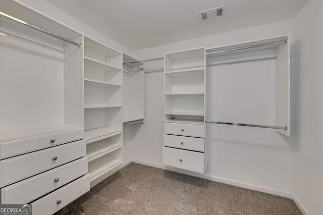 a view of an empty walk in closet