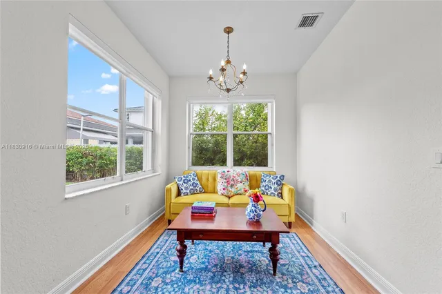 a room with furniture and a window