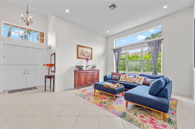 a living room with furniture and a window