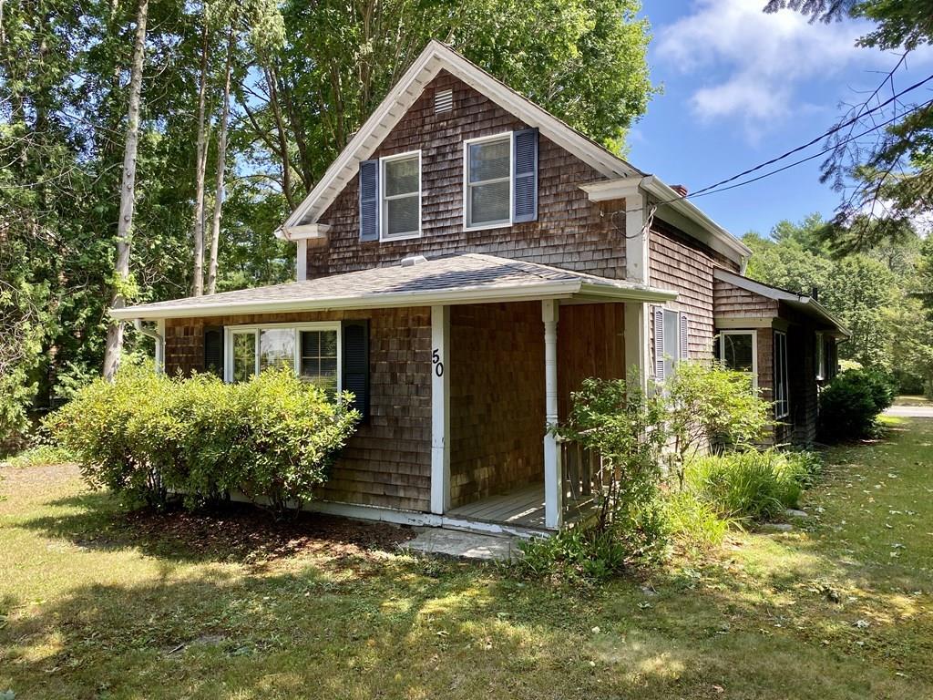 50 Great Neck Road Wareham, MA 02558 - Photo 1 of 21 a front view of a house with garden