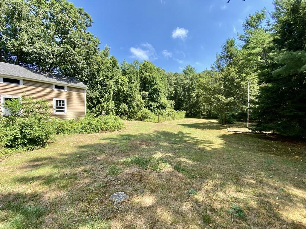 50 Great Neck Road Wareham, MA 02558 - Photo 17 of 21 a view of a house with a yard
