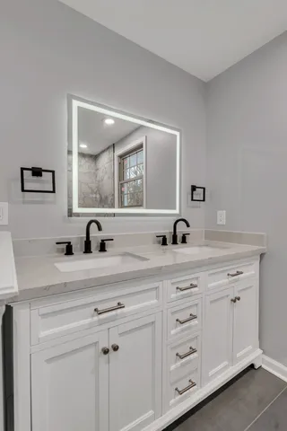 a front view of a house with a garage