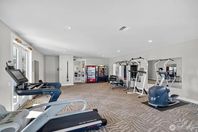 a view of a room with gym equipment