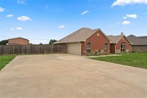 238 Rudder Road Gun Barrel City, TX 75156 - Photo 1 of 27 a front view of a house with yard