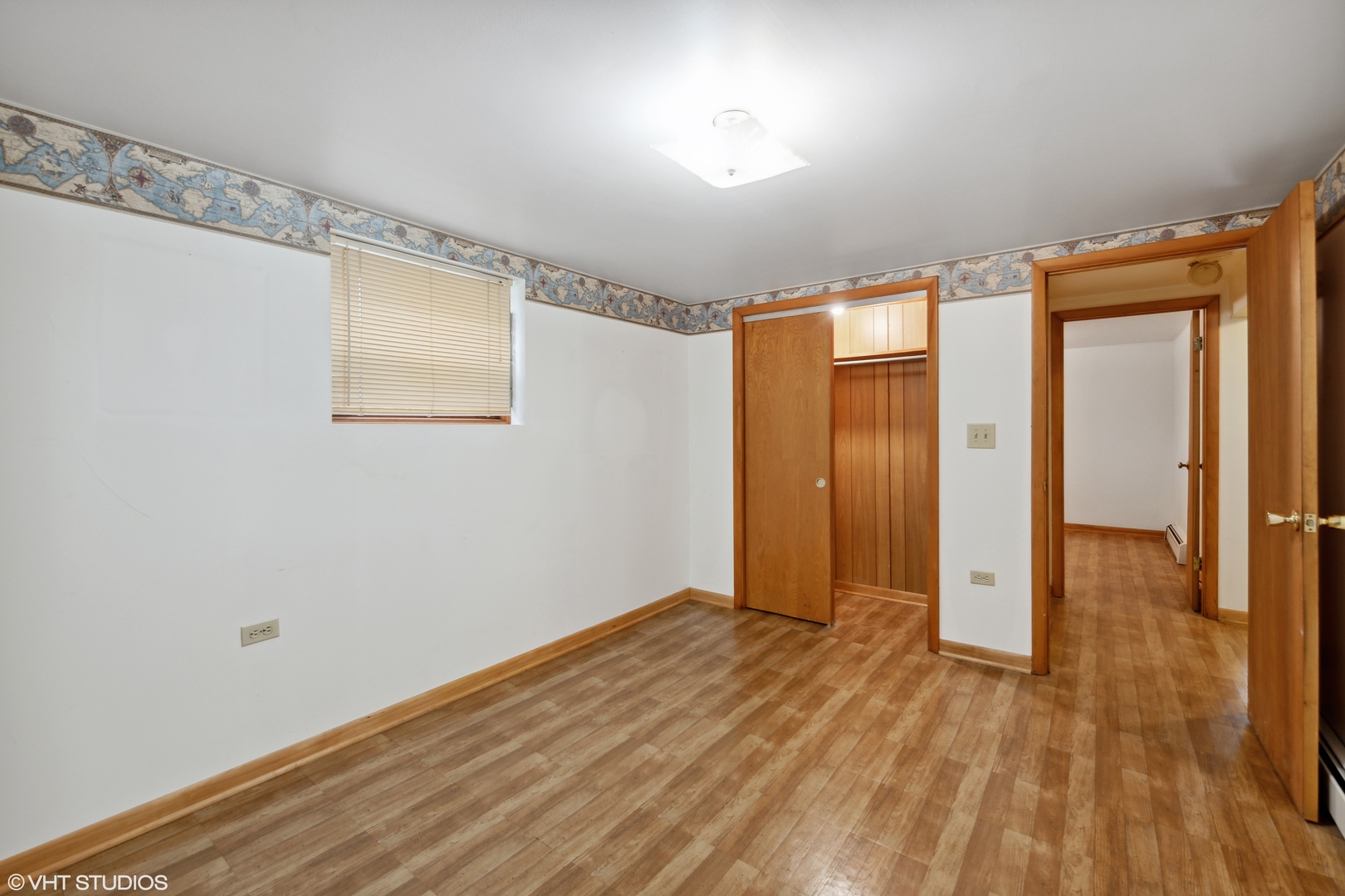 Undisclosed Address Chicago, IL 60641 - Photo 11 of 19 a view of empty room with wooden floor