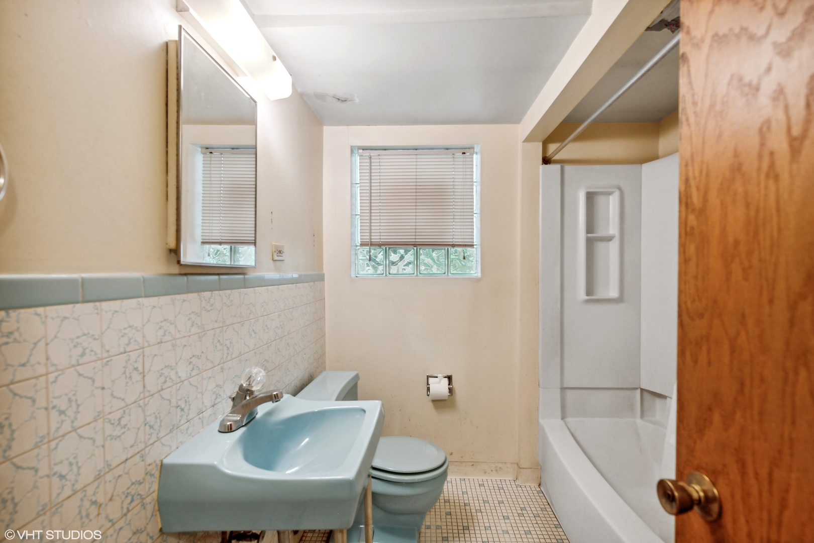 Undisclosed Address Chicago, IL 60641 - Photo 12 of 19 a bathroom with a sink and toilet