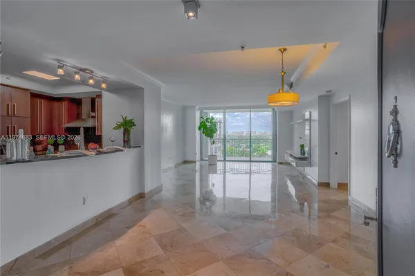a view of a living room and window