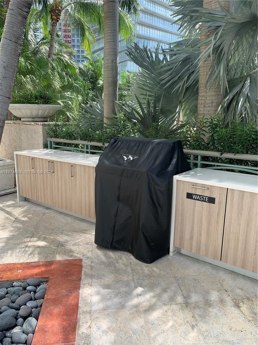 3400 Southwest 27th Avenue, Unit 906 Miami, FL 33133 - Photo 25 of 35 a view of outdoor space and yard