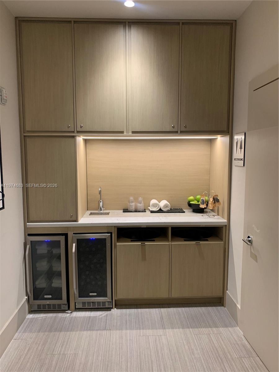 3400 Southwest 27th Avenue, Unit 906 Miami, FL 33133 - Photo 35 of 35 a view of entryway with wooden floor