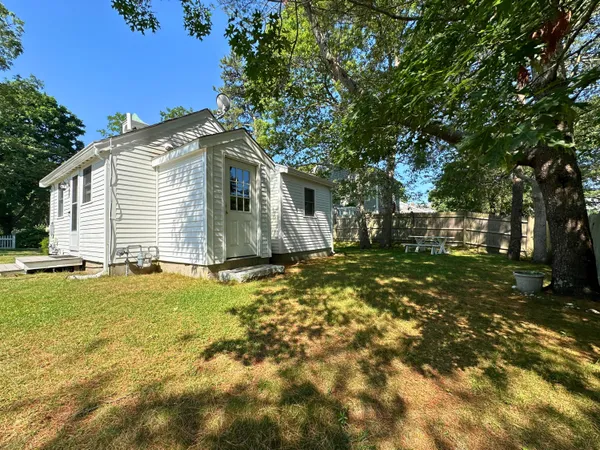 a front view of house with yard