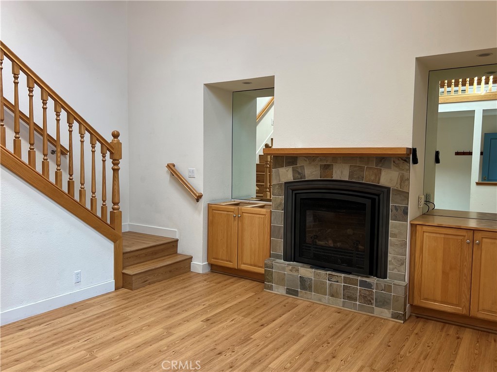 1530 Emerson Road Cambria, CA 93428 - Photo 10 of 54 Gas log Fireplace remotely controlled.
