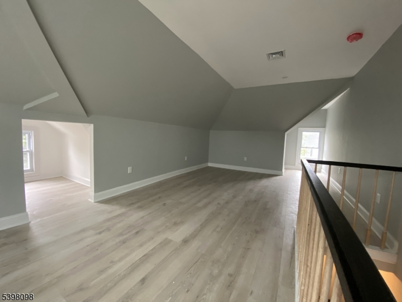 59 West Stewart Street Washington, NJ 07882 - Photo 20 of 22 a view of hallway with wooden floor