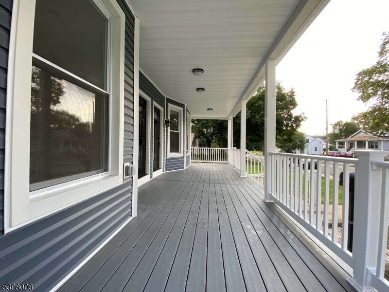 59 West Stewart Street Washington, NJ 07882 - Photo 2 of 22 a view of a balcony with wooden floor