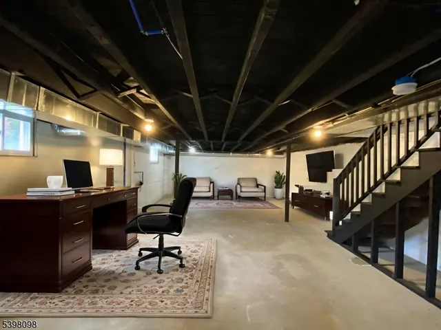 a view of a livingroom with furniture