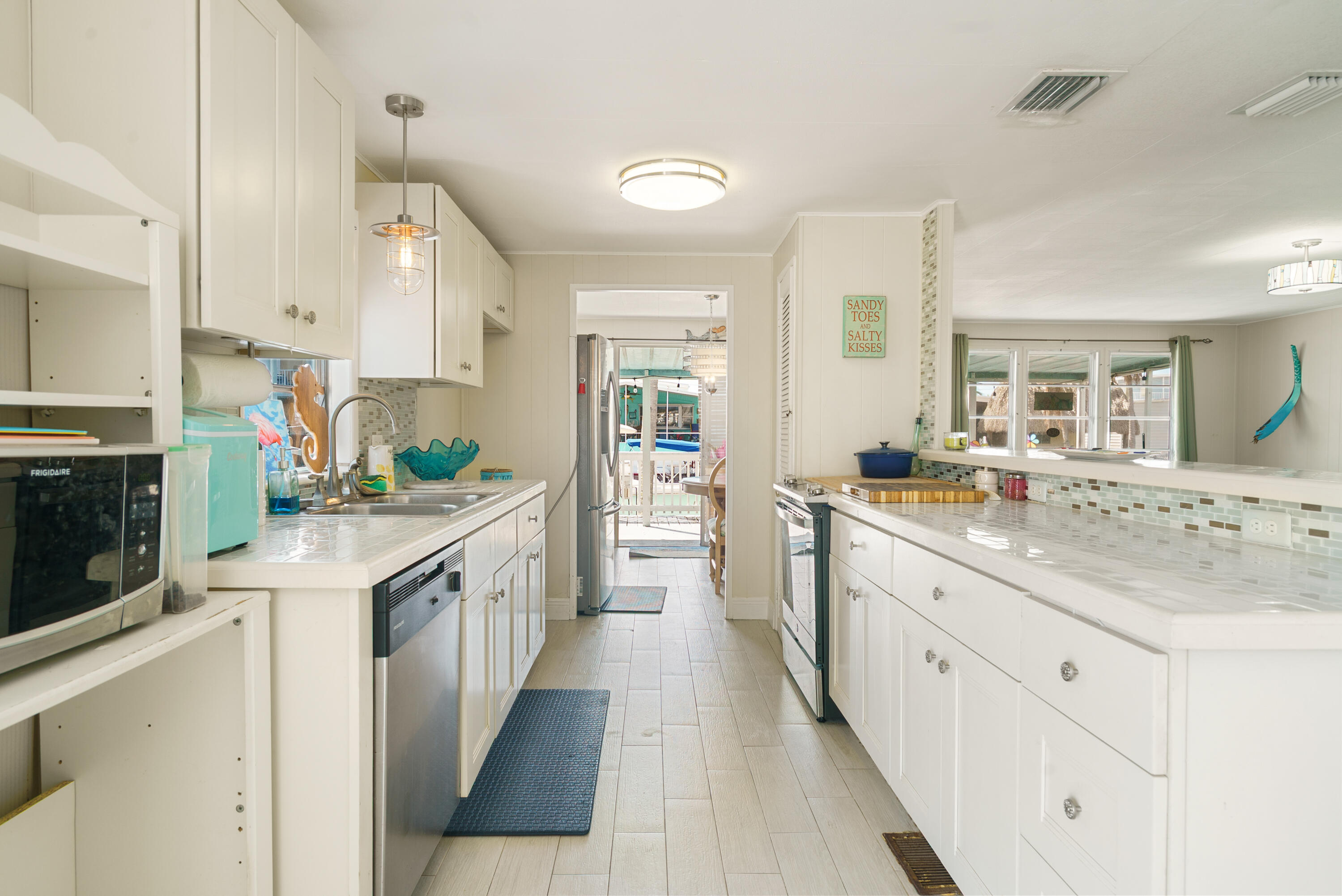 205 Humpty Dumpty Drive Key Largo, FL 33037 - Photo 5 of 40 Bright white updated kitchen