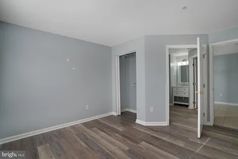 a view of a house with a tree