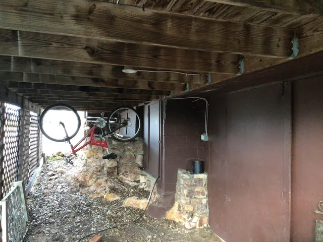 a view of outdoor space with green field and trees