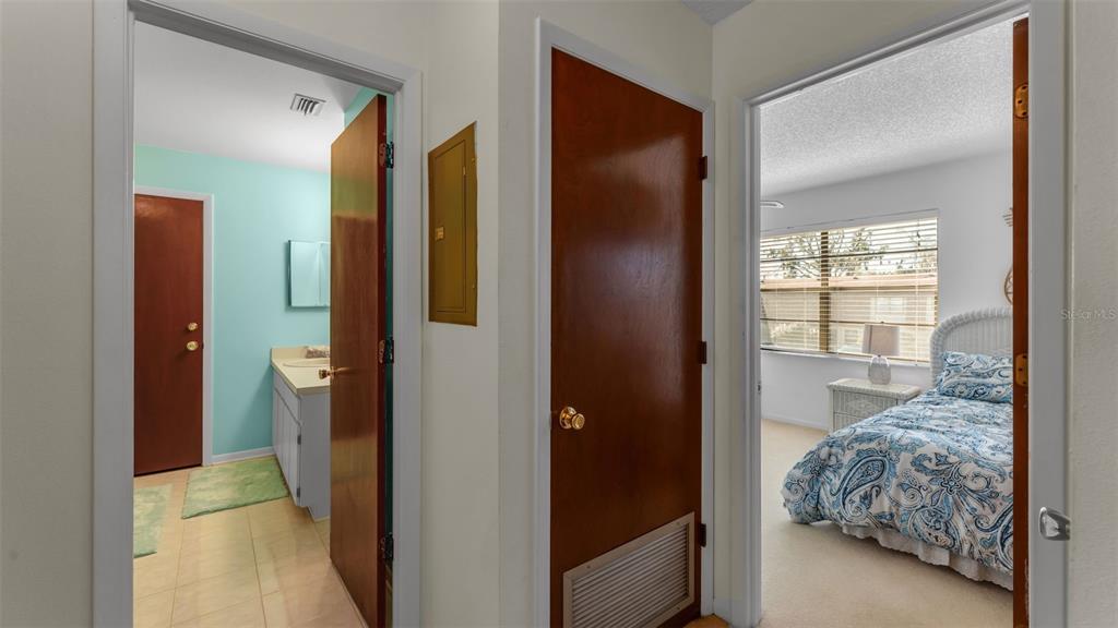 6051 Topher Trail, Unit 6051 Mulberry, FL 33860 - Photo 24 of 38 a view of a bedroom from bathroom
