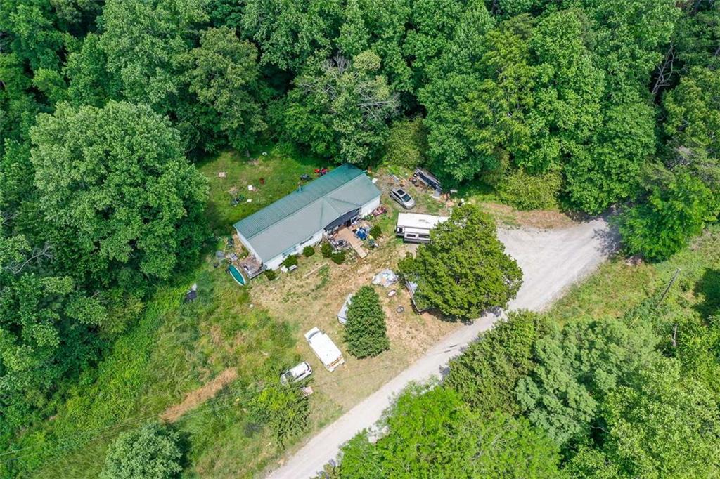 1010 Painter Road Talking Rock, GA 30175 - Photo 4 of 25 an aerial view of a house with a yard