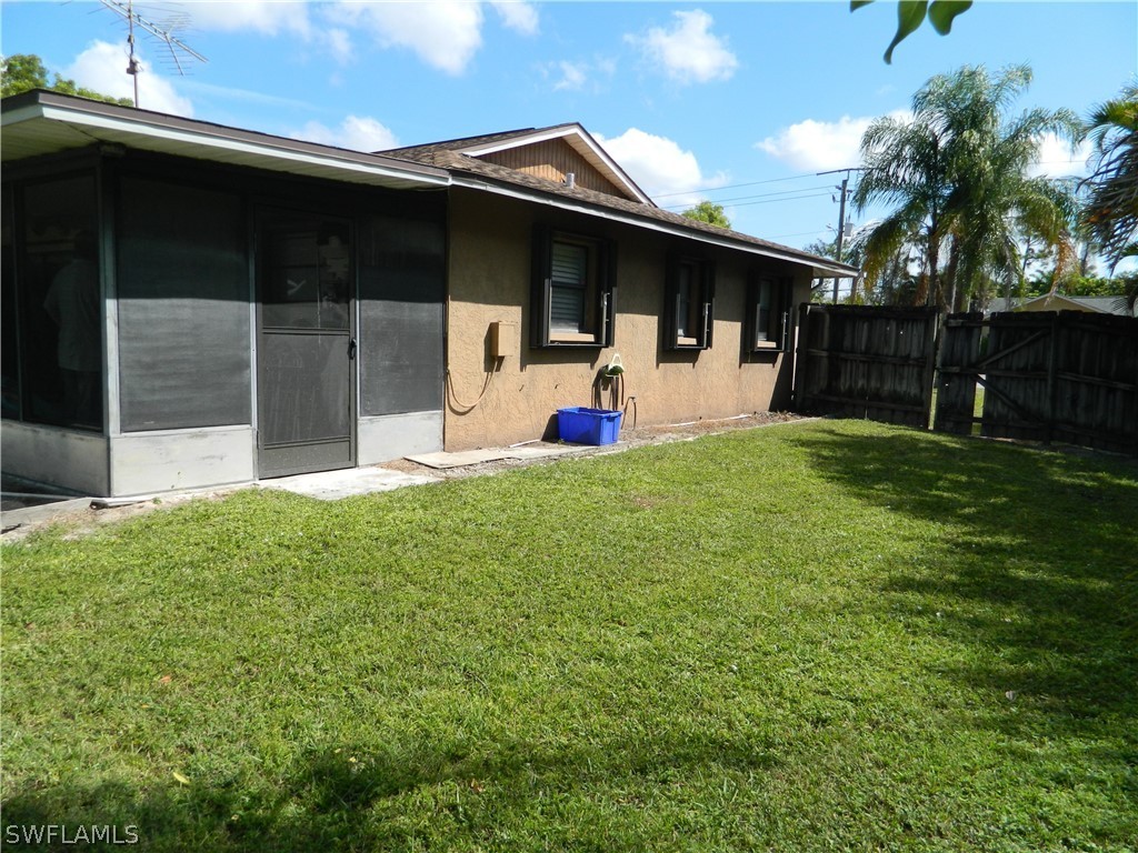 17396 Oriole Road Fort Myers, FL 33967 - Photo 16 of 17 a front view of a house with garden