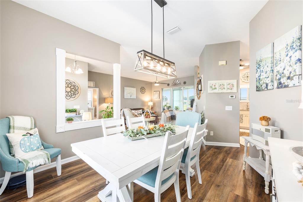 5719 Northwest 25th Loop Ocala, FL 34482 - Photo 23 of 67 a view of a dining room with furniture window and outside view