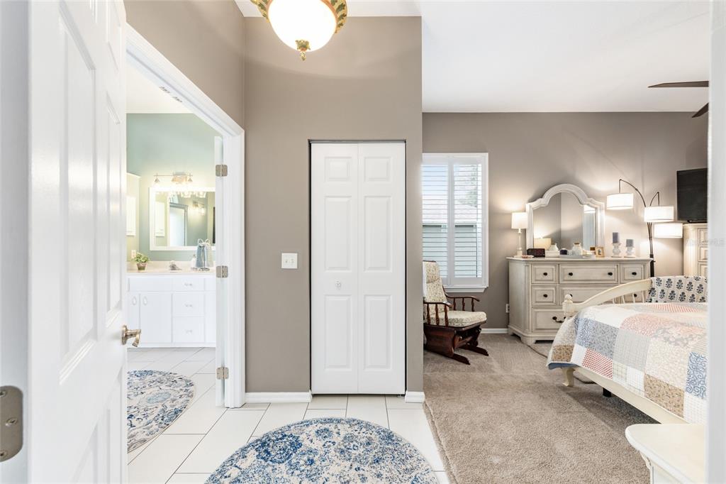 5719 Northwest 25th Loop Ocala, FL 34482 - Photo 35 of 67 a bedroom with a bed and a view of bedroom