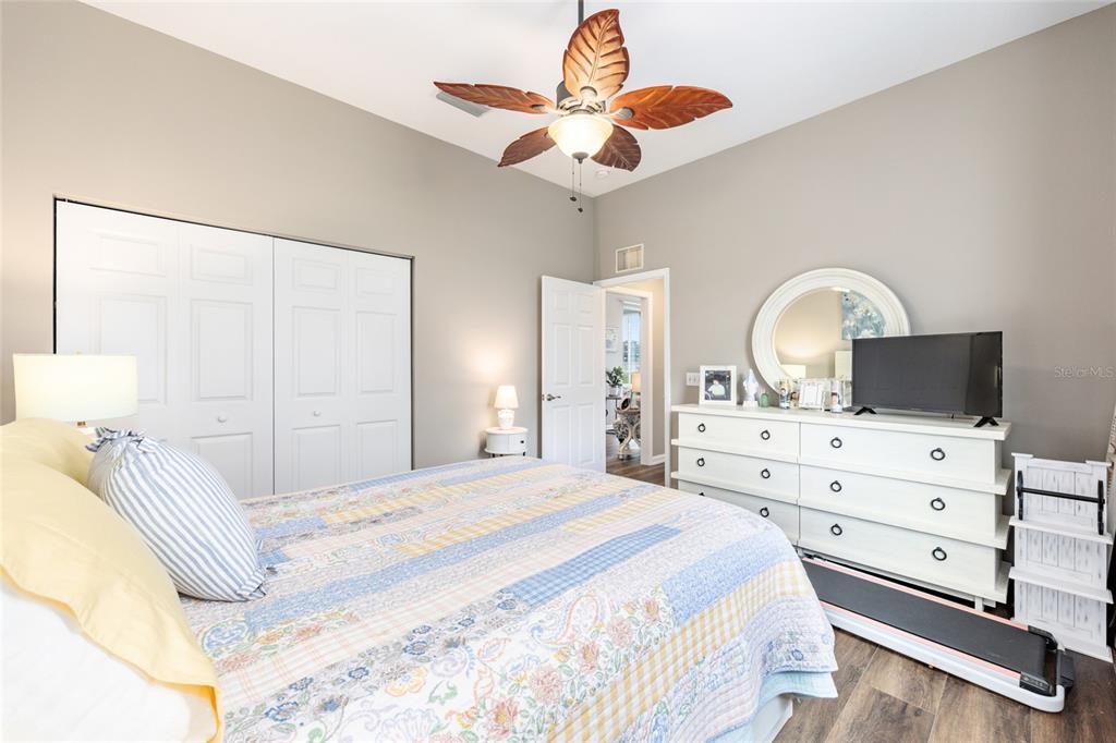 5719 Northwest 25th Loop Ocala, FL 34482 - Photo 39 of 67 a bedroom with a bed and a dresser