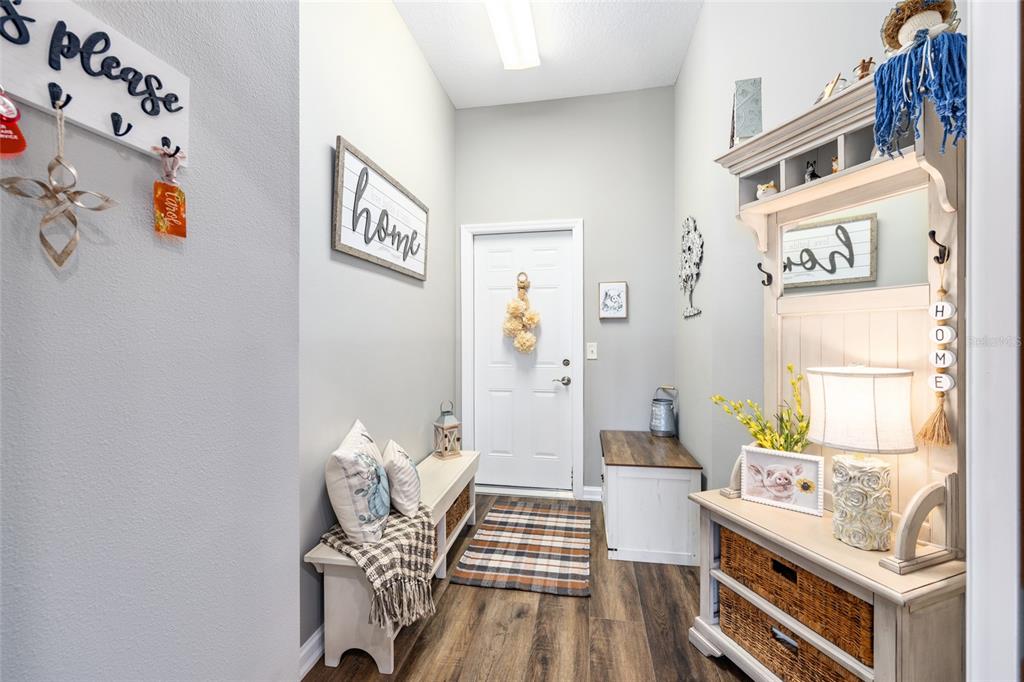 5719 Northwest 25th Loop Ocala, FL 34482 - Photo 42 of 67 a bedroom with a bed and wooden floor