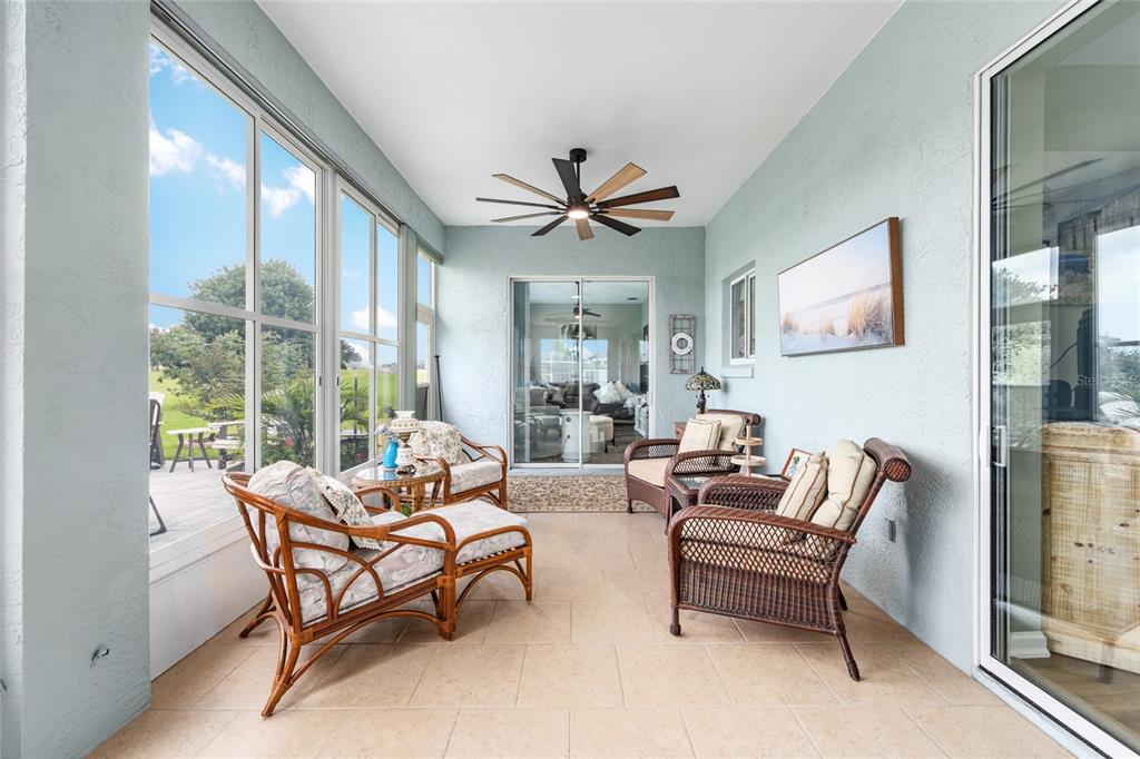 5719 Northwest 25th Loop Ocala, FL 34482 - Photo 46 of 67 a living room with furniture and a large window