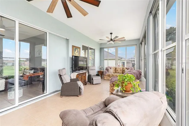 an aerial view of a house with a ocean view