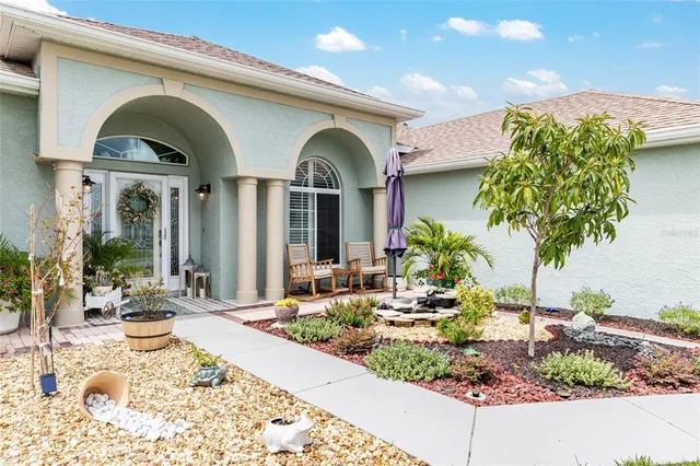 a view of a lake with a yard