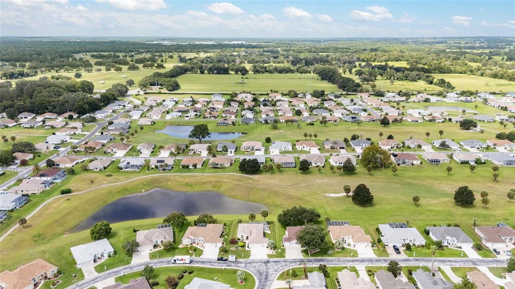 5719 Northwest 25th Loop Ocala, FL 34482 - Photo 60 of 67 a view of a city with an ocean
