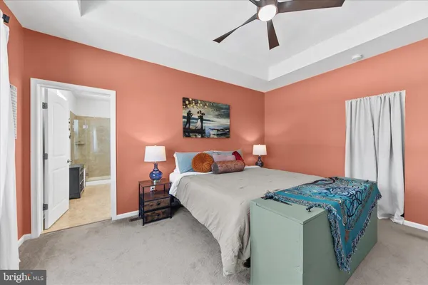 a view of livingroom with furniture and floor to ceiling window
