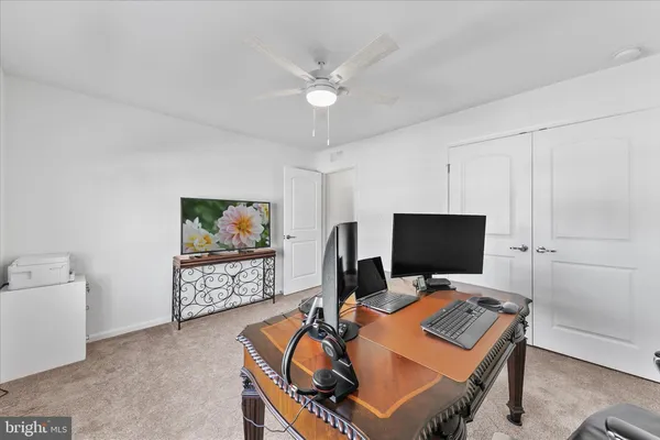 a house with trees in front of it