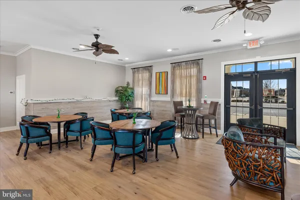 a view of a chairs and table in patio