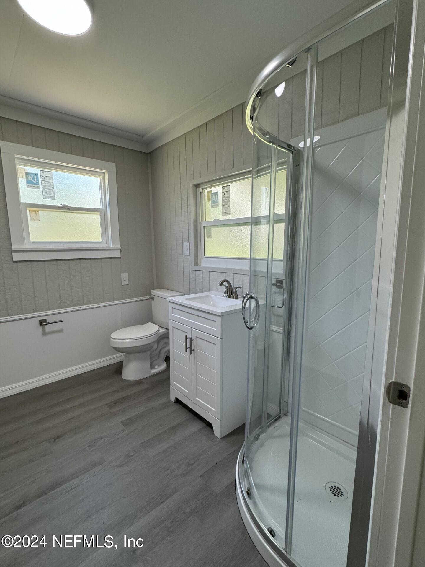 130 Boca Raton Road Satsuma, FL 32189 - Photo 13 of 20 a bathroom with a sink toilet and shower