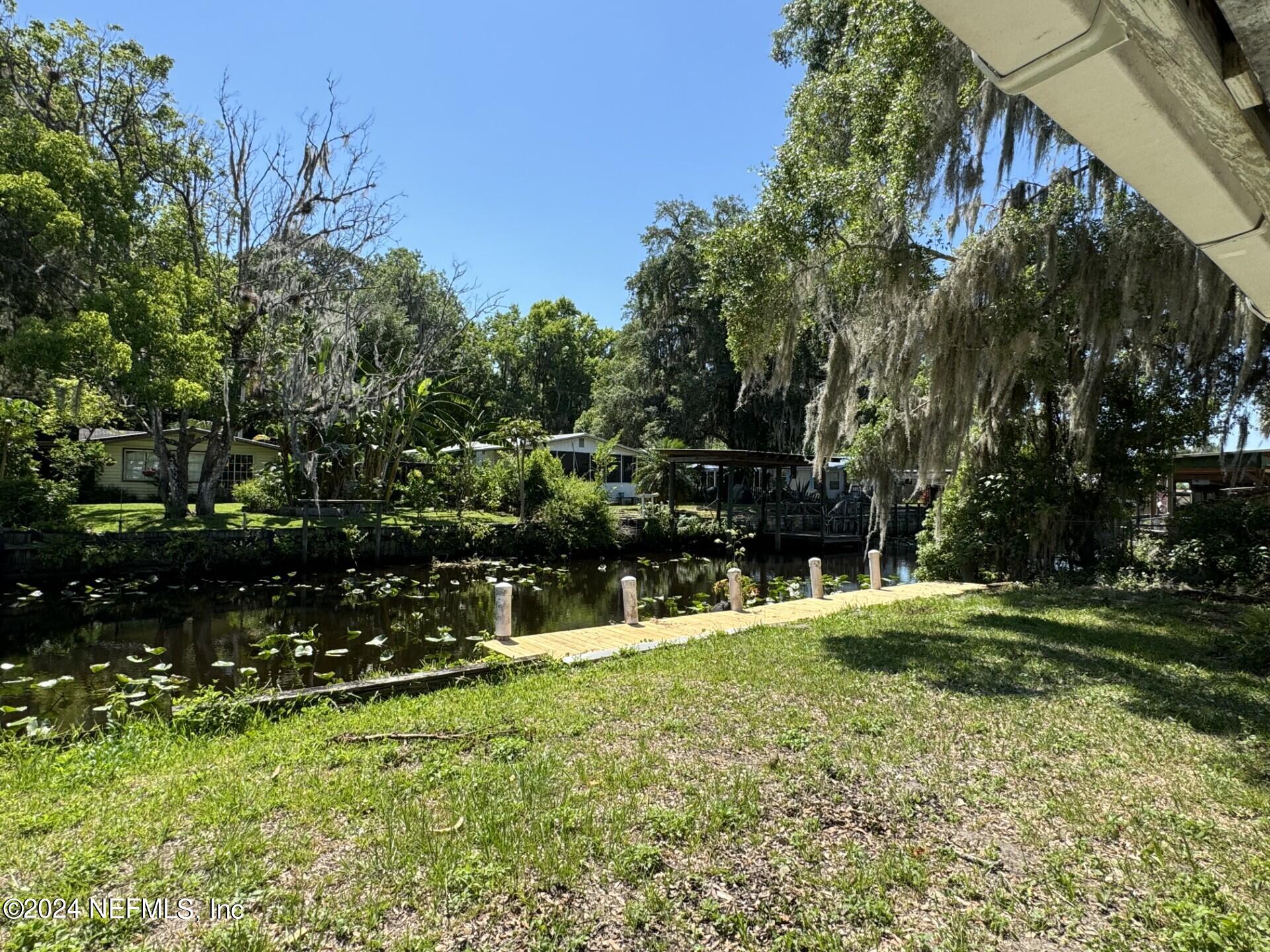 130 Boca Raton Road Satsuma, FL 32189 - Photo 3 of 20 a view of a park with large trees