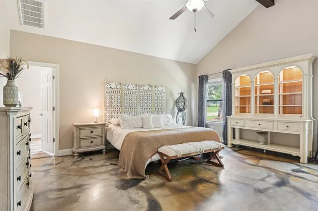 a kitchen with granite countertop a sink a stove and cabinets