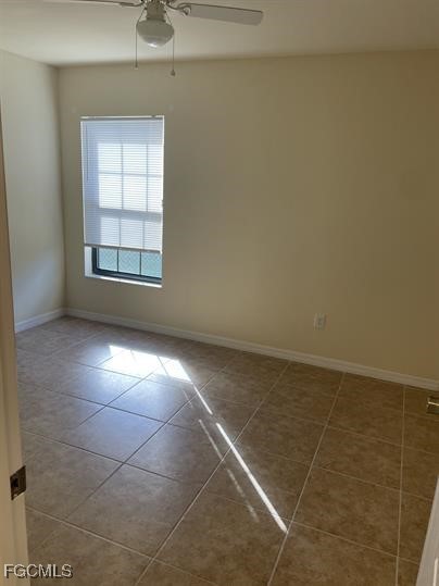 3818 Southwest 16th Place, Unit 3818 Cape Coral, FL 33914 - Photo 6 of 10 en empty room with windows