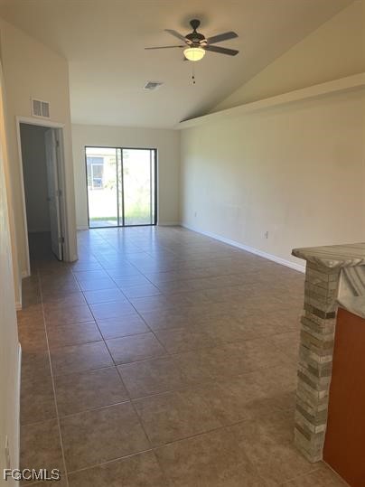 3818 Southwest 16th Place, Unit 3818 Cape Coral, FL 33914 - Photo 7 of 10 a view of empty room with windows and ceiling fan