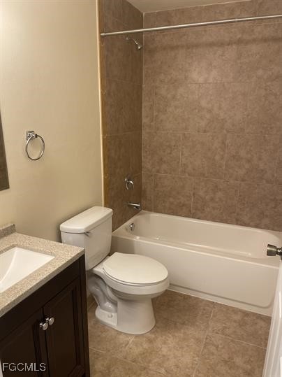 3818 Southwest 16th Place, Unit 3818 Cape Coral, FL 33914 - Photo 10 of 10 a bathroom with a granite countertop bathtub shower sink vanity and toilet