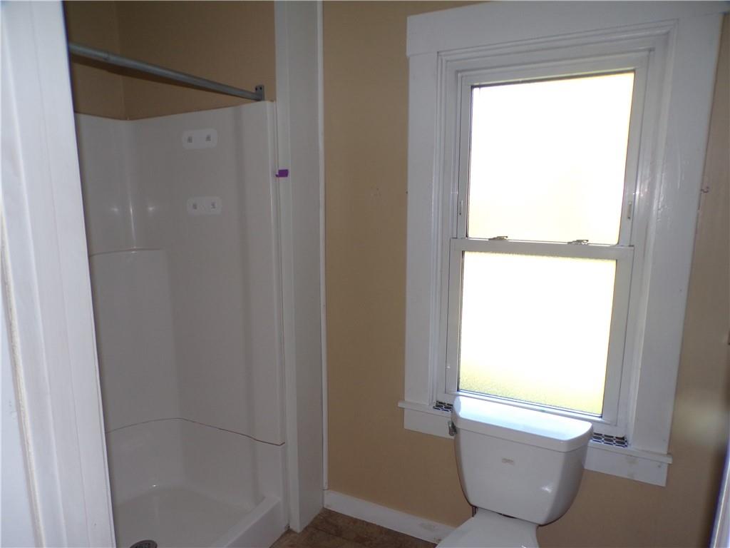 575 Grant Street Indiana, PA 15701 - Photo 11 of 19 a bathroom with a bathtub and shower