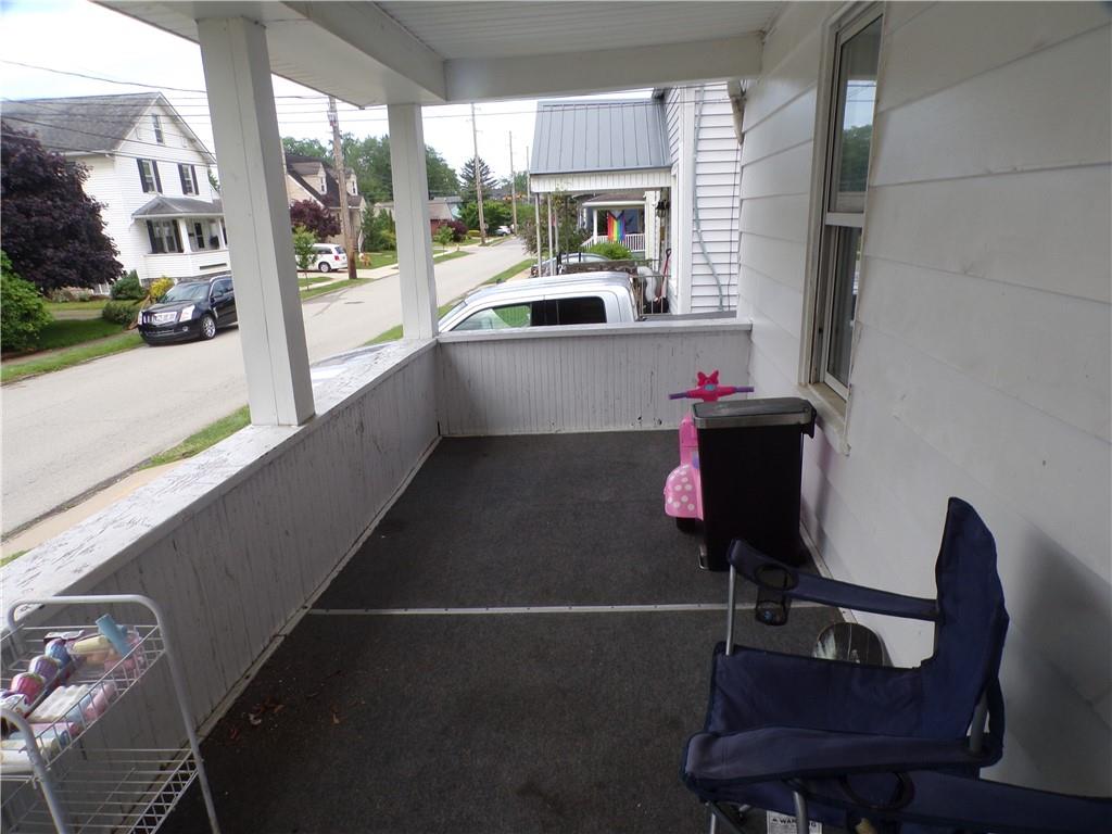 575 Grant Street Indiana, PA 15701 - Photo 3 of 19 a living room with furniture and a floor to ceiling window