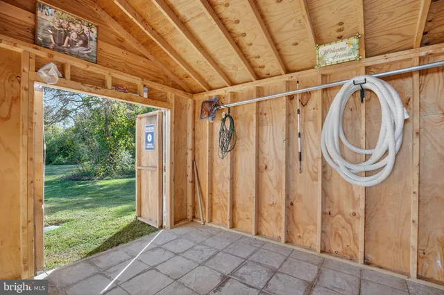 a view of a back yard with a patio