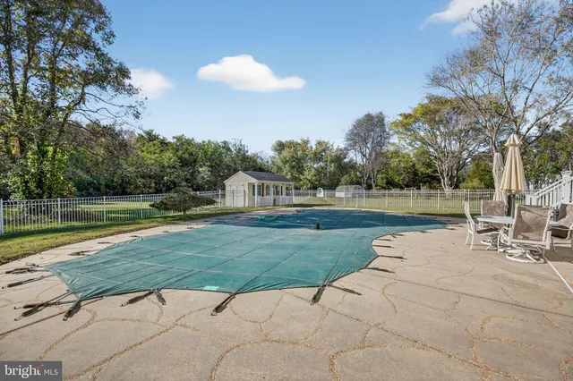 a view of a lake with a yard